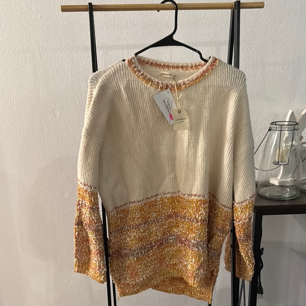 Cozy Cream and Orange Sweater